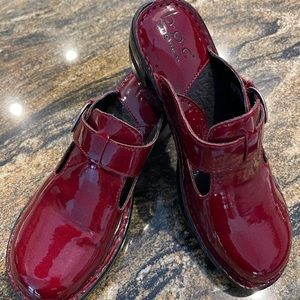 New without tags. B.O.C. Red slip Ins. Clog type.  Shiny patent leather. Size 8.